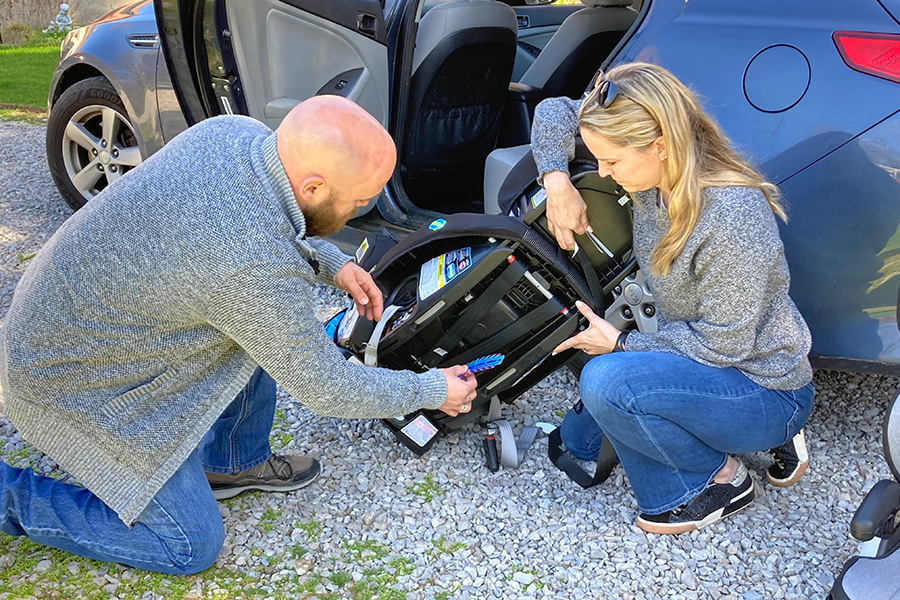 Placing the very first two ROTH ID TAG™ on Rory and Ayla Roth’s car seats